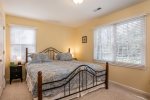 Master bedroom offers tv and ensuite full bath on main level